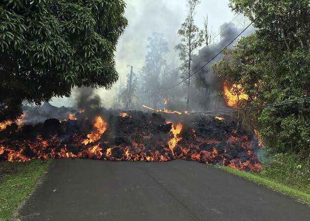 Hawaii lava swallows up a car in crazy time-lapse video
