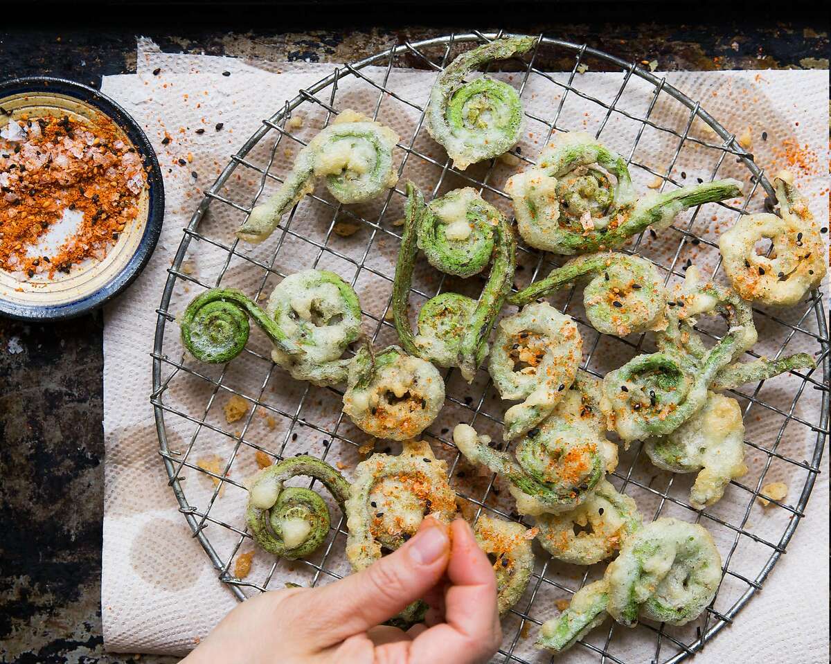 Fiddlehead tempura with Sriracha creme fraiche, one of the recipes featured in "The Berkeley Bowl Cookbook," by Laura McLively (Parallax Press; $34.95).