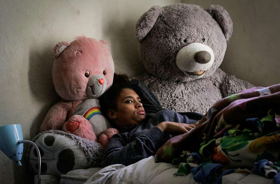 Former Camp Everytown camper Carmel Evans, 18 watches television in her room in San Jose, California, on Sunday, Nov. 19, 2017. Photo: Gabrielle Lurie / The Chronicle