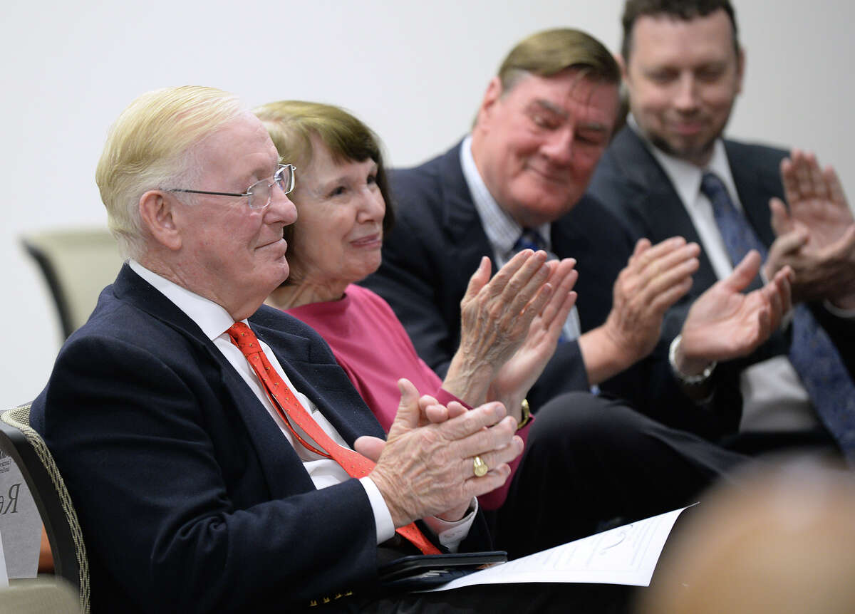 Former Bridge City native Larry Lawson, left, is applauded Monday, May 07 during an event at Lamar to recognize him as a recent recipient of the Horatio Alger Award. Other recipients include U.S. presidents, actors and professional athletes. Lawson attended Lamar before becoming a successful entrepreneur. Photo taken Monday, May 07, 2018 Guiseppe Barranco/The Enterprise