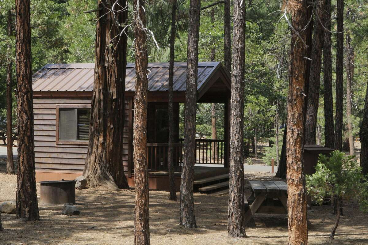 A camping cabin at McArthur-Burney Falls State Park, located near Burney in Northern California -- the park features a gorgeous 129-foot waterfall and Lake Britton, full of water.