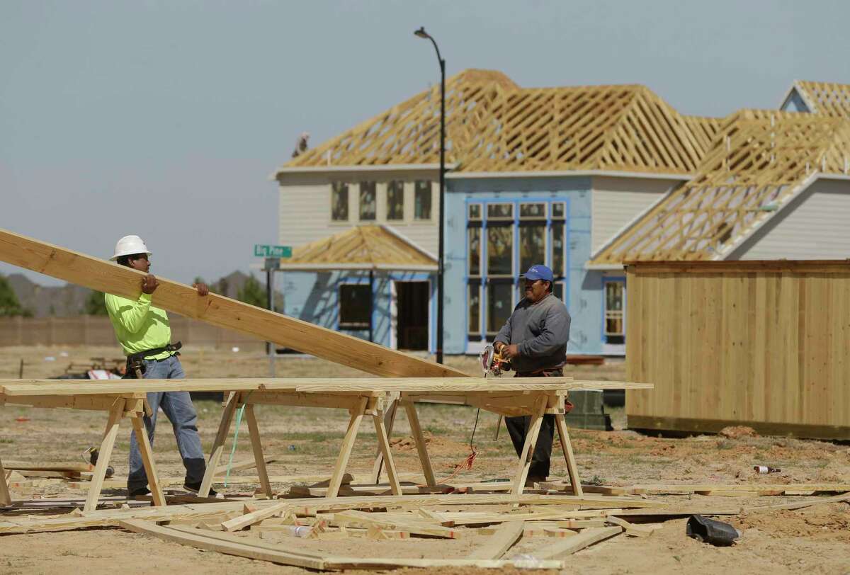 Construction is shown in Parkland Village in the master-planned community of Bridgeland Wednesday, March 21, 2018, in Houston. ( Melissa Phillip / Houston Chronicle )