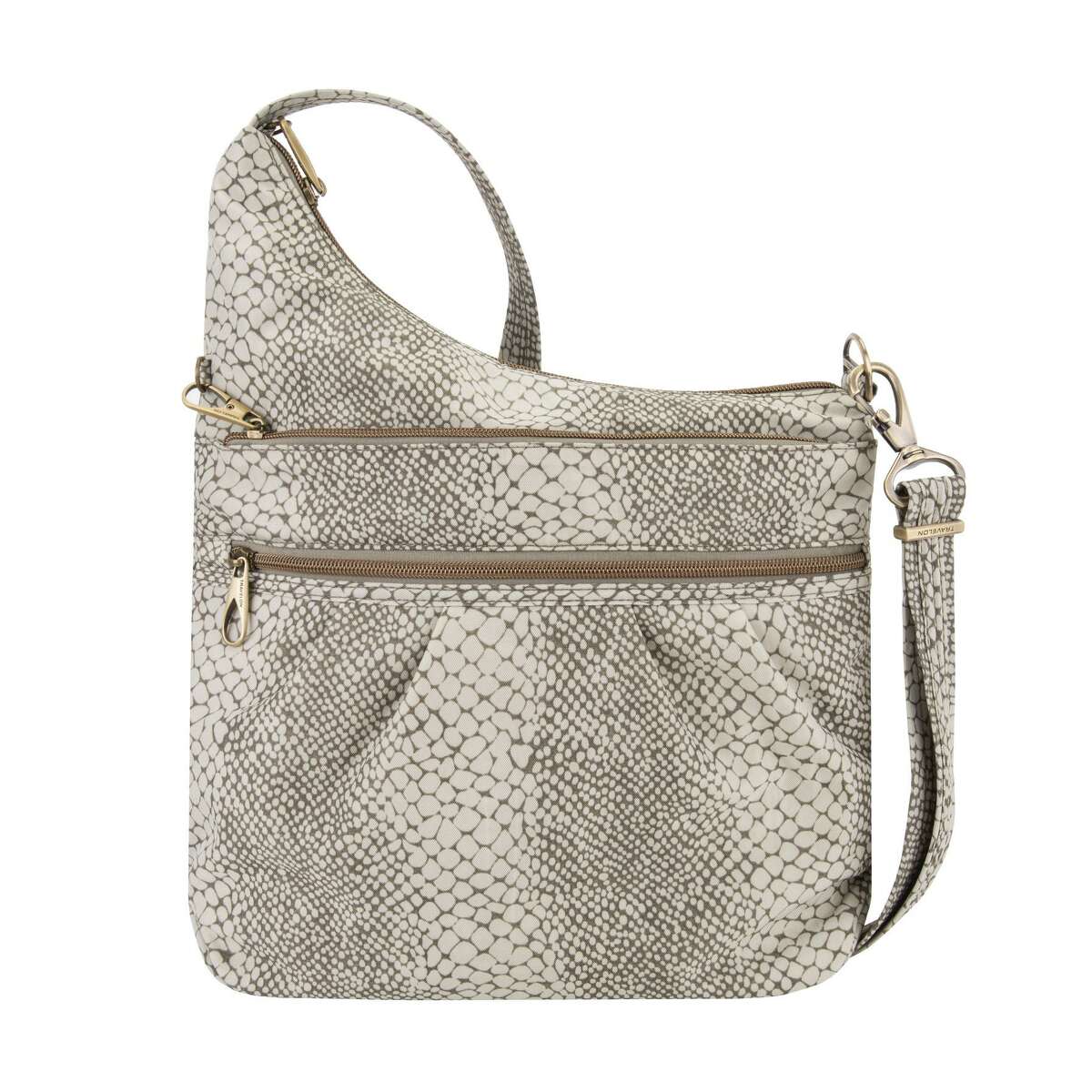 Travelon’s new snakeprint bags provide a fun and neutral color with the safety features that we’ve come to expect from Travelon, including slash-resistant fabric and straps and RFID protection for credit cards. This crossbody design has plenty of zippered pockets for easy organization.