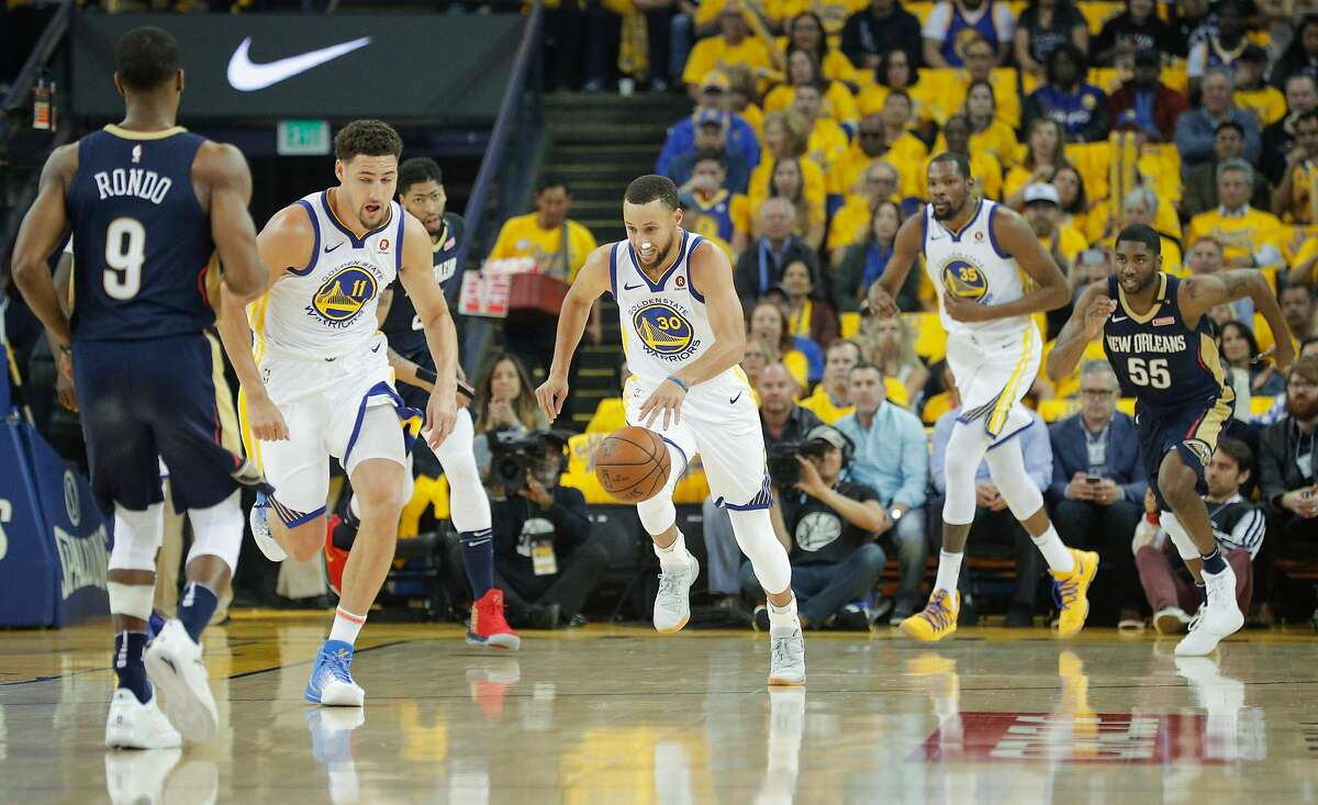 Golden State Warriors' Stephen Curry runs the ball upcourt in the first quarter during game 5 of the Western Conference Semifinals between the Golden State Warriors and the New Orleans Pelicans at Oracle Arena on Tuesday, May 8, 2018 in Oakland, Calif.