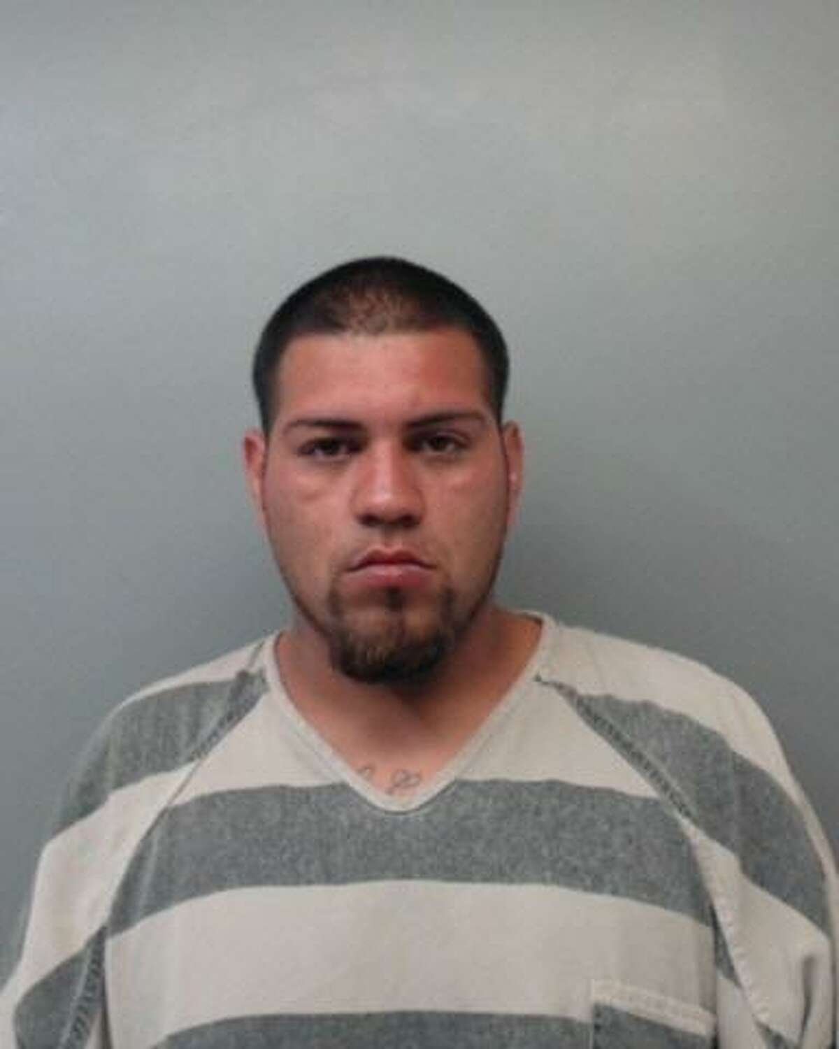 Daniel Cuellar, 23, was charged with aggravated assault with knife or cutting instrument and aggravated assault, family violence.