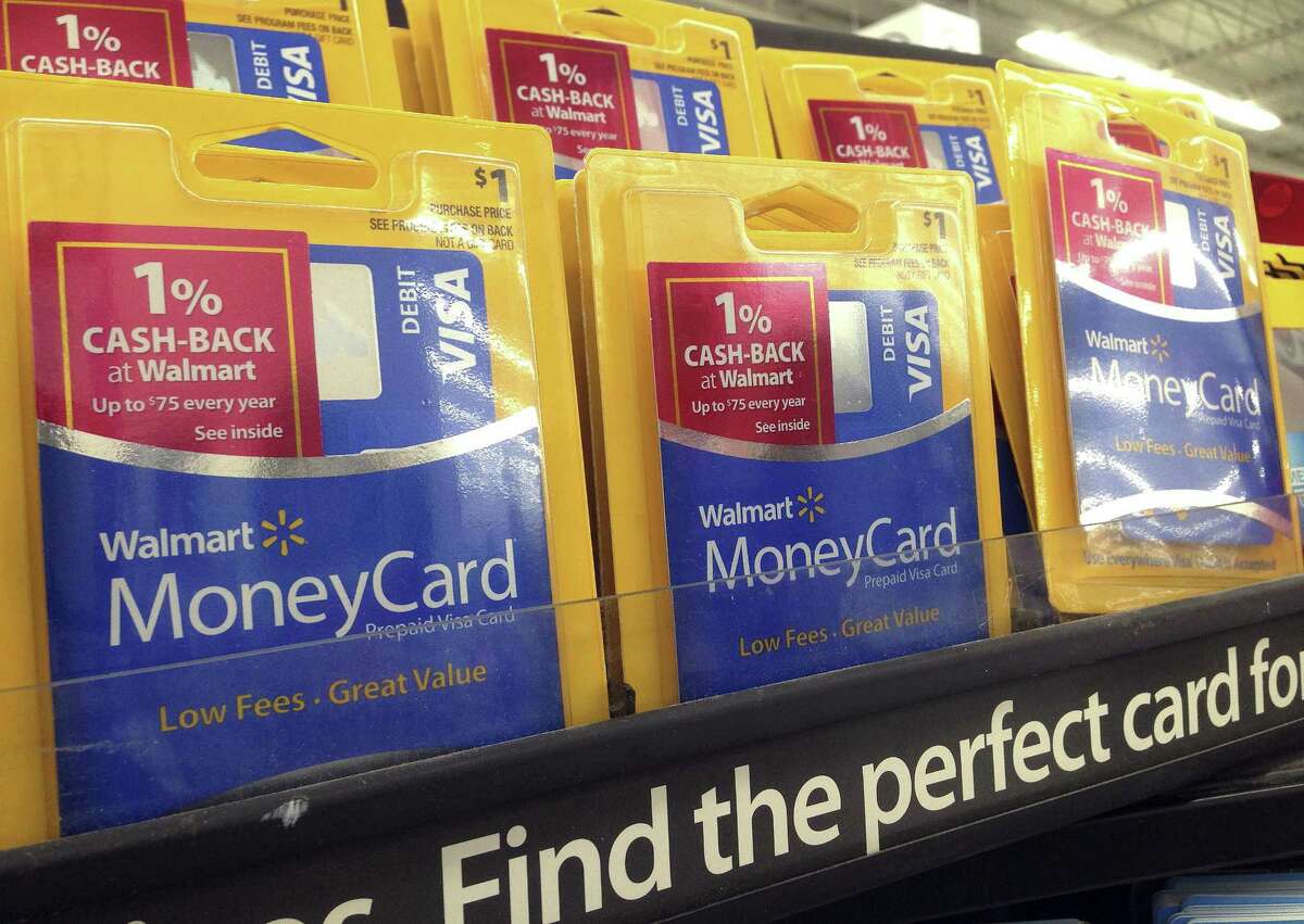 In this March 9, 2017 photo, money cards are displayed at a store in Methuen, Mass. (AP Photo/Elise Amendola)