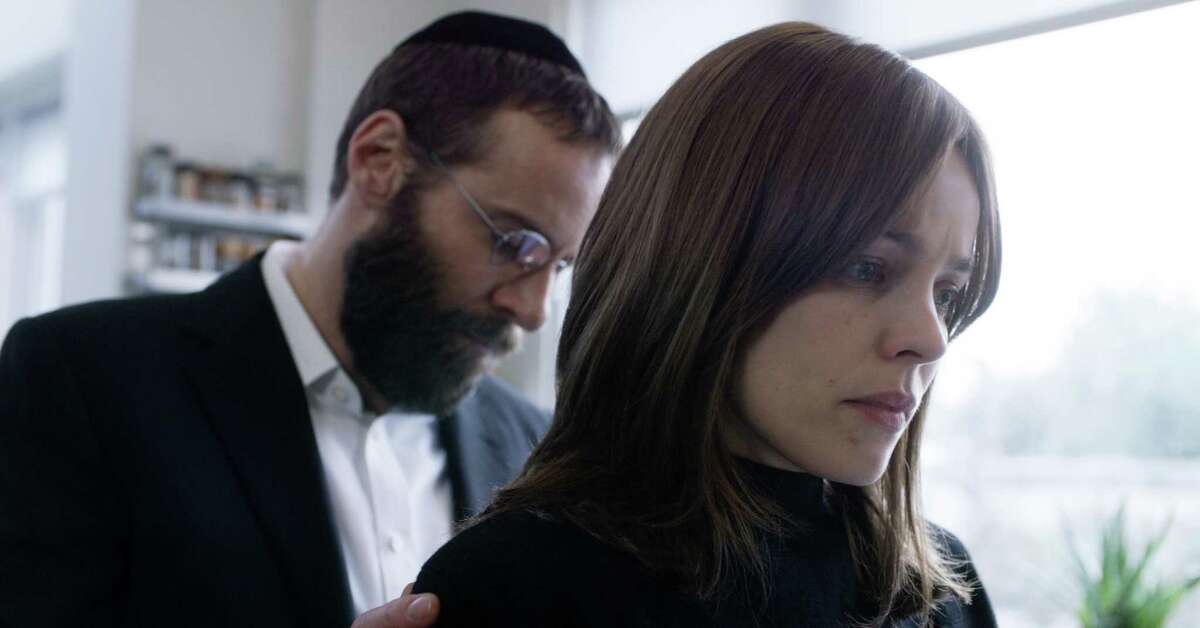 Alessandro Nivola, left, and Rachel McAdams in a scene from “Disobedience.”