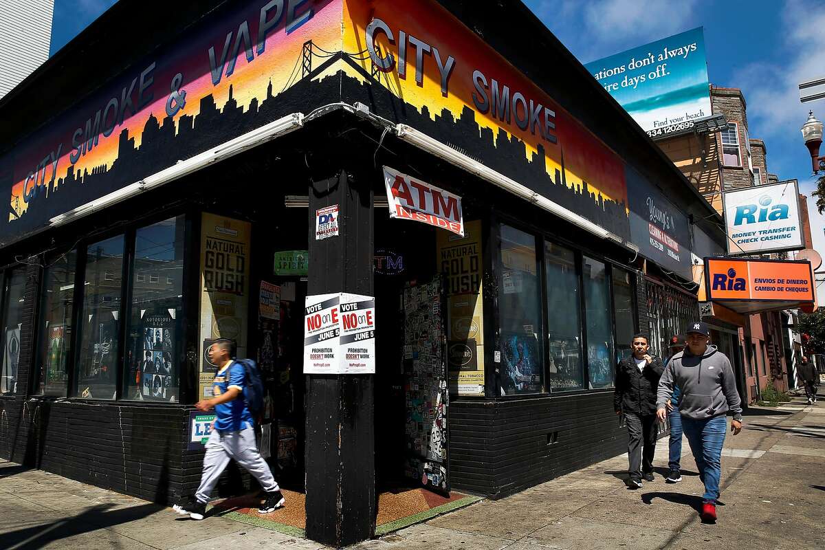 City Smoke Shop, Tuesday, May 8, 2018, in San Francisco, Calif. The shop displays a sign against Proposition E, which would prevent the sale of products like flavored tobacco and menthol cigarettes.