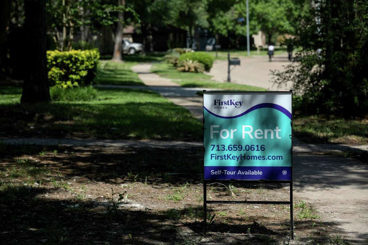 Signs reading "For Rent" and "For Sale" line the streets in the Bear Creek neighborhood, Tuesday, April 17, 2018, in Houston. ( Jon Shapley / Houston Chronicle )