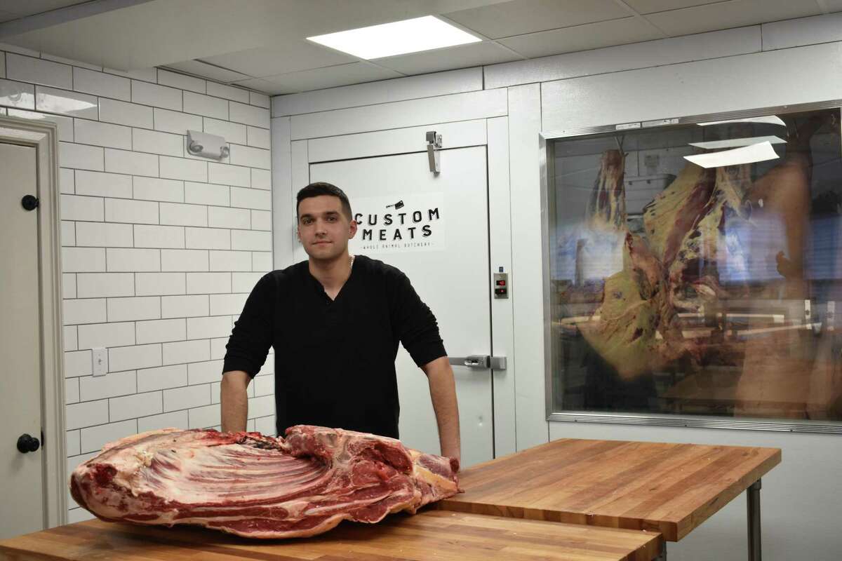 Biscuit and Bones co-founder Louis Molnar on April 27, 2018, at Custom Meats in Fairfield, Conn., where his company procures meat for pet food that Biscuit and Bones delivers fresh throughout Fairfield County and the region.