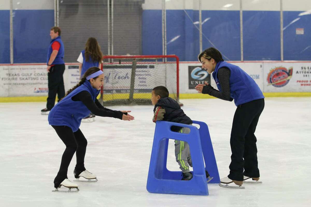 Jordan Virata, Tam Do and Maggie Agulera skate at the Sugar Land Ice Arena.
