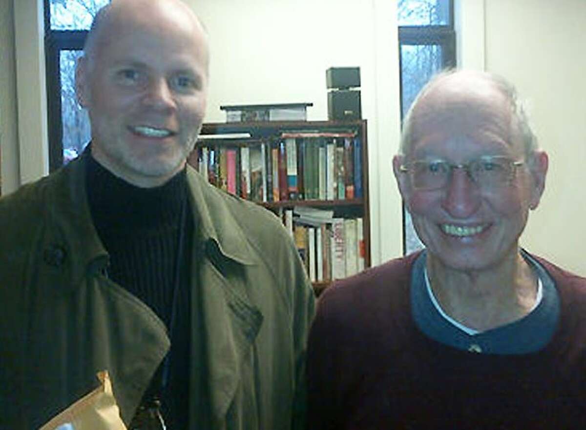 Former student Michael Huber (left) and Professor Warren Roberts shortly before his retirement.