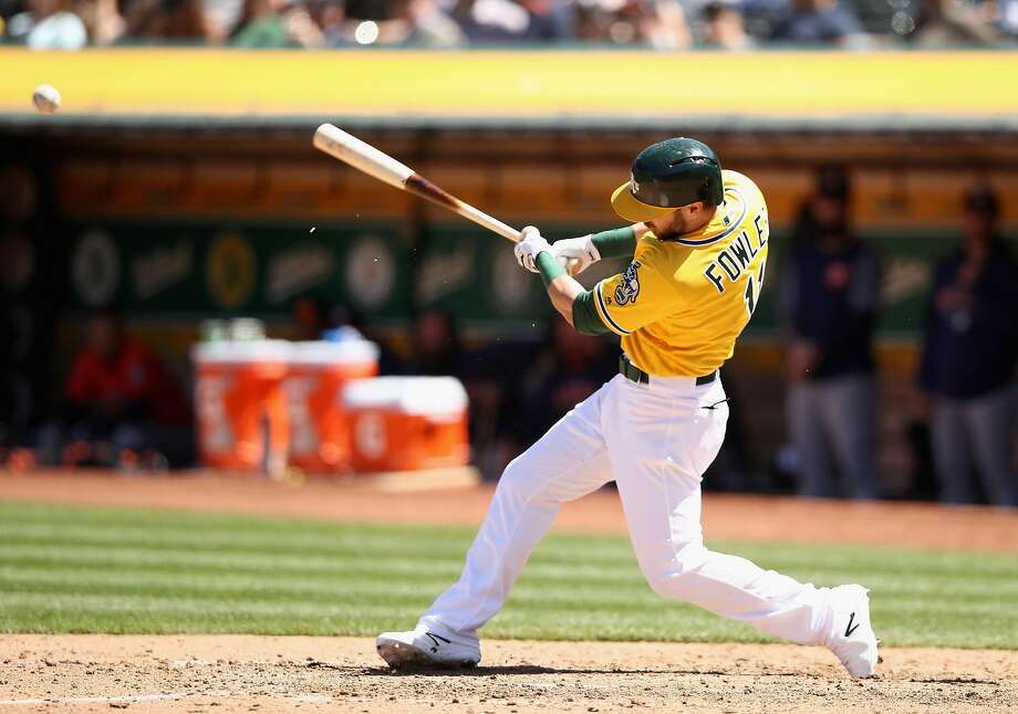 OAKLAND, CA - MAY 09:  Dustin Fowler #11 of the Oakland Athletics lines out to second base in his first major league at bat in the seventh inning of their game against the Houston Astros at Oakland Alameda Coliseum on May 9, 2018 in Oakland, California.  (Photo by Ezra Shaw/Getty Images) Photo: Ezra Shaw / Getty Images