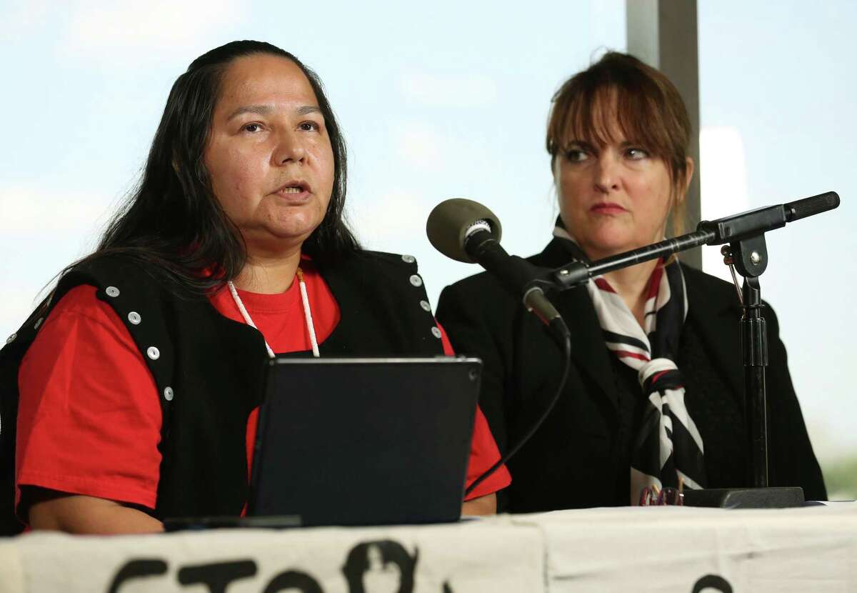 Neskonlith te Secwepemc chief Judy Wilson, left, talks with reporters during a press conference at the Houston Public Library following an appearance Kinder Morgan International's Annual General Meeting Wednesday, May 9, 2018, in Houston. Wilson talked about the opposition to the Trans Mountain Pipeline. ( Godofredo A. Vasquez / Houston Chronicle )