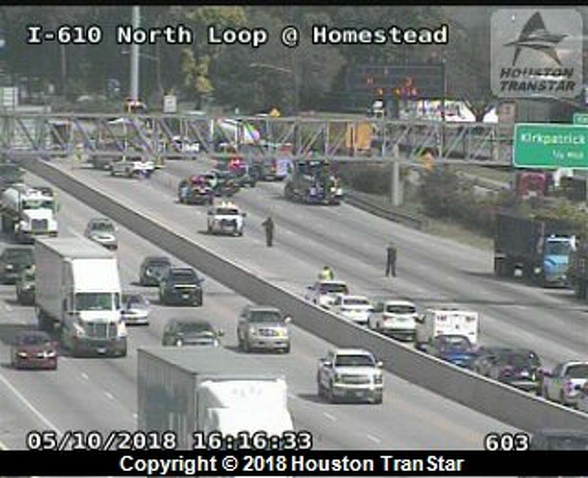 A big rig crash that spilled hazardous materials all over the North Loop has all eastbound mainlanes shut down just before the Eastex Freeway.
