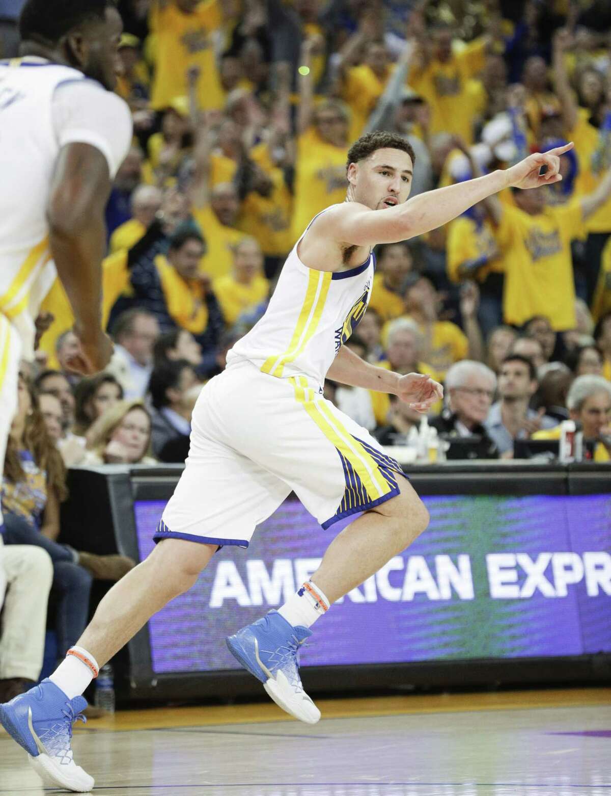 Golden State Warriors' Klay Thompson reacts after hitting a three-pointer in the second quarter during game 1 of round 2 of the Western Conference Finals between the Golden State Warriors and the New Orleans Pelicans at Oracle Arena on Saturday, April 28, 2018 in Oakland, Calif.