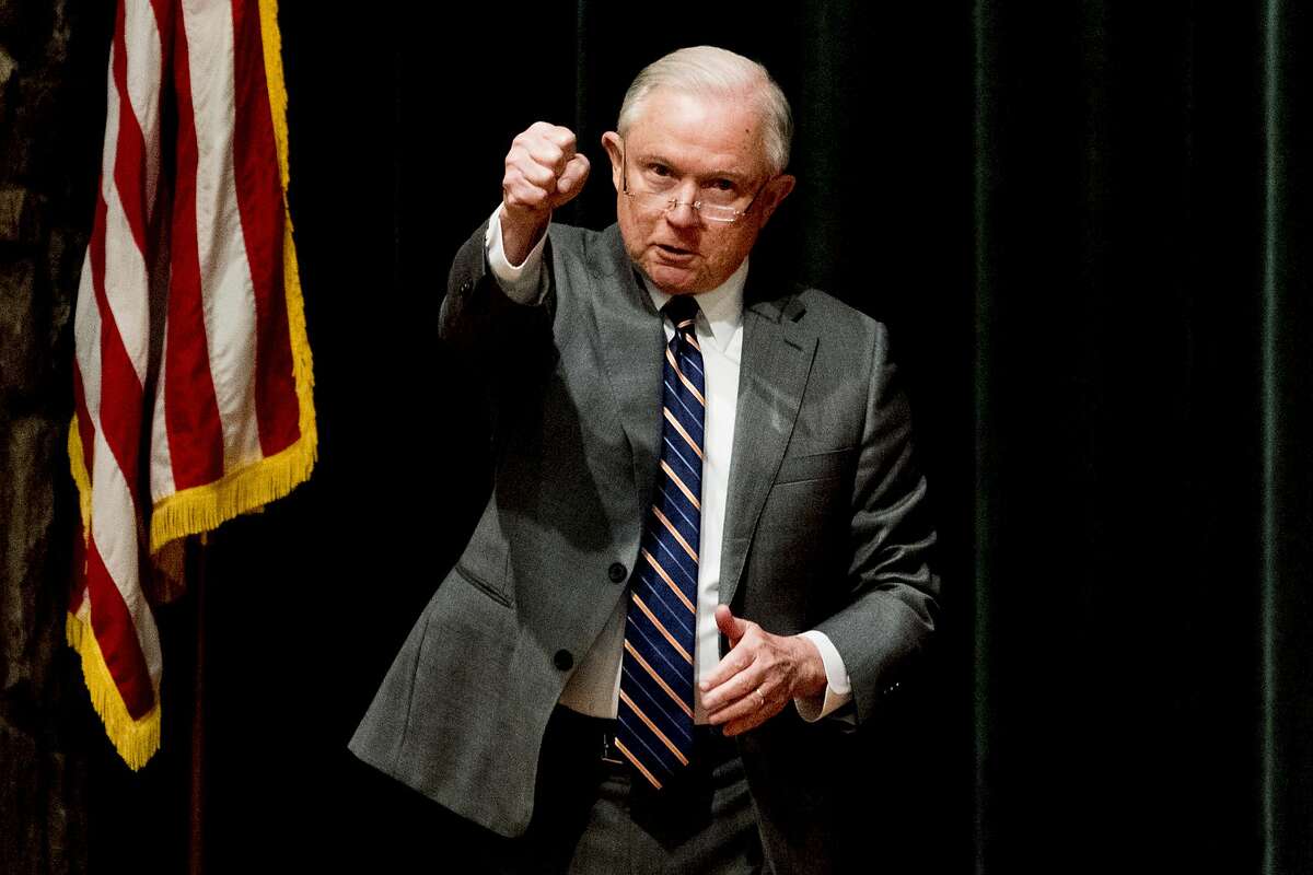 Attorney General Jeff Sessions pumps his fist to the crowd at the Law Enforcement Training Conference at the Gatlinburg Convention Center in Gatlinburg, Tenn., on Tuesday, May 8, 2018. (Calvin Mattheis/Knoxville News Sentinel via AP)