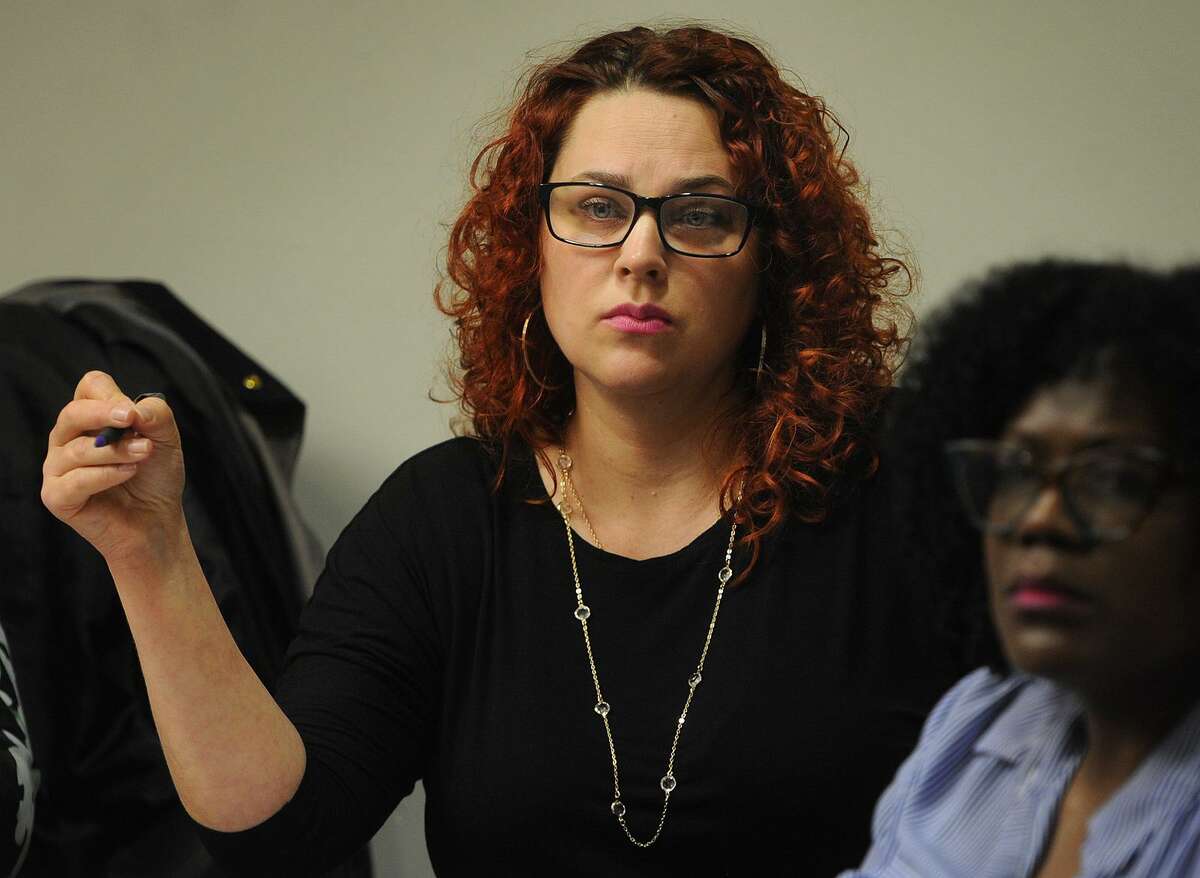 Kate Rivera, of Bridgeport, questions Human Resources Consultant Randi Frank during a public forum over the search for a police chief at City Hall in Bridgeport, Conn. on Thursday, May 10, 2018.