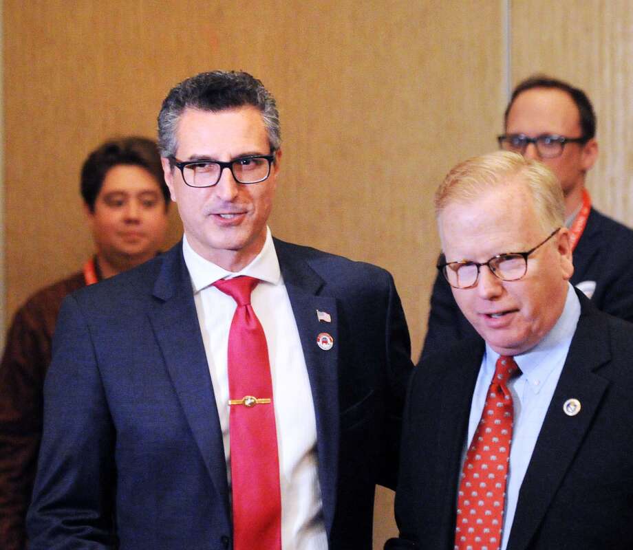 Candidate Manny Santos, left, the former Mayor of Meriden, during the nominating process for the Republican candidate for the 5th District Congressional seat at the Republican State Convention at Foxwoods Casino, Mashantucket, Conn., Friday, May 11, 2018. At right is Danbury Mayor Mark Boughton. Photo: Bob Luckey Jr. / Hearst Connecticut Media / Greenwich Time