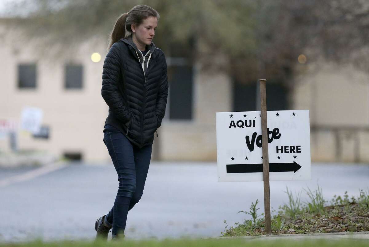 People head to the polls at the Brook Hollow Branch of the San Antonio Public Library March 6. Early voting begins in runoff elections today.