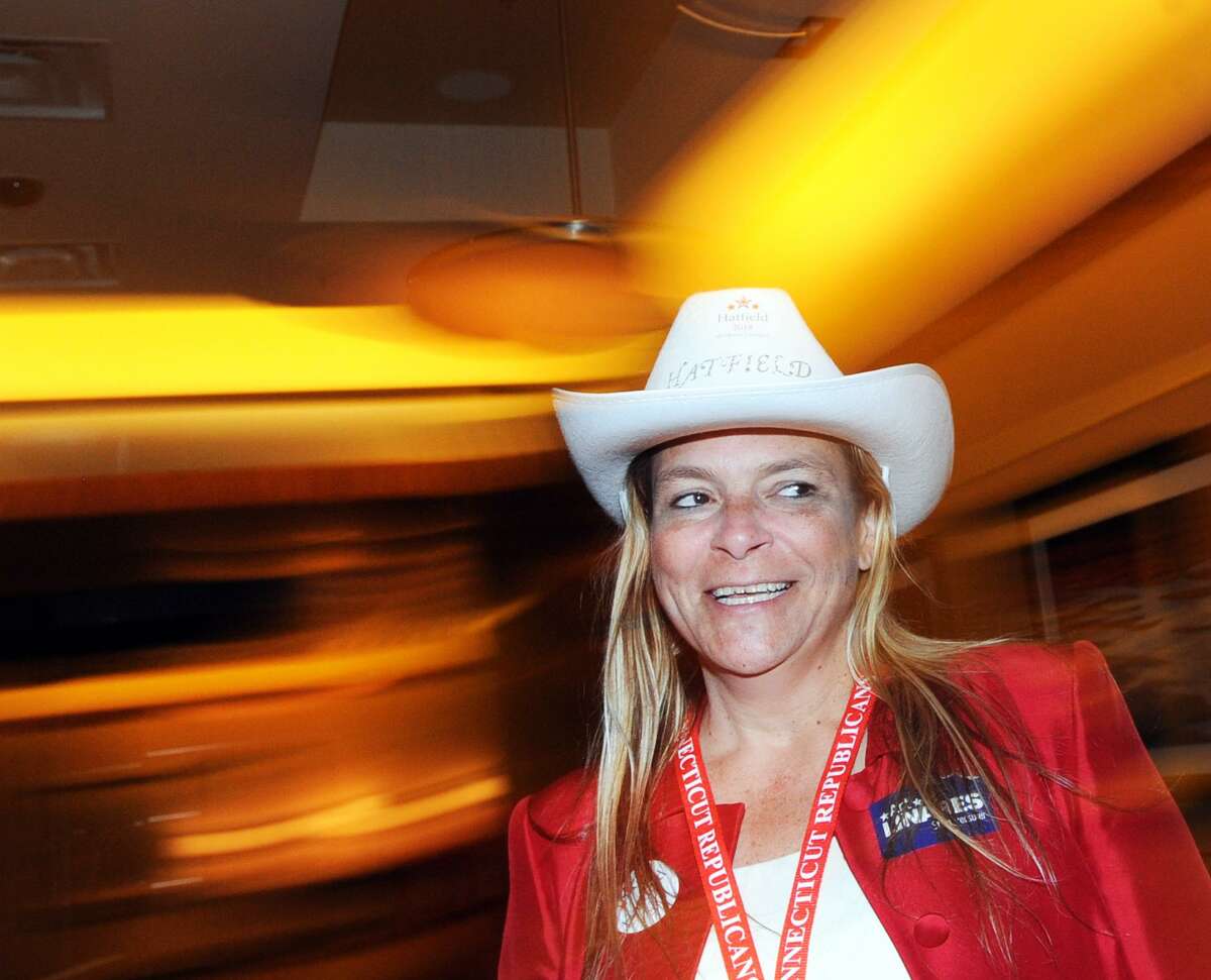 Sarah Jorgensen of Newington sports a cowgirl hat as a supporter of Susan Hatfield for attorney general at the Republican State Convention at Foxwoods Casino in Mashantucket, Conn. Friday. Jorgensen said "Maybe a casino is a little too exciting for the delegates. There sure are plenty of distractions."