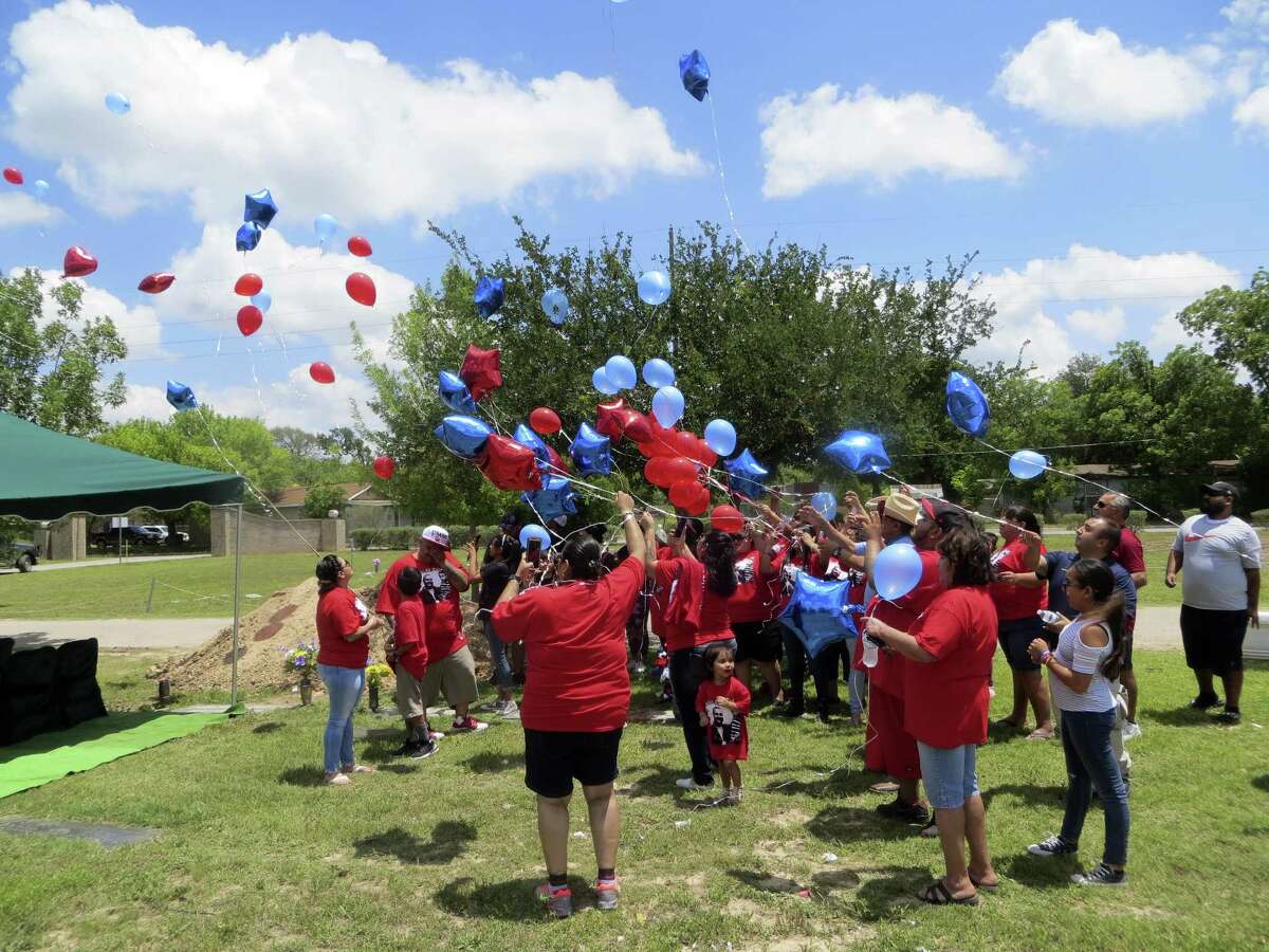 Friends and relatives of Davaughn Rodriguez, 4, who was slain in 2011, released balloons at a remembrance ceremony Friday 5-11-18 at his grave in Uvalde.v