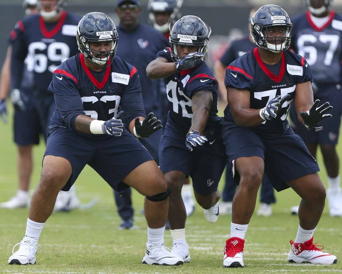 The Houston Texans rookie players K.J. Malone, from left, Terry Swanson and Martinas Rankin go through a drill during training at the 2018 Houston Texans Rookie Minicamp on Saturday, May 12, 2018, in Houston. ( Yi-Chin Lee / Houston Chronicle )