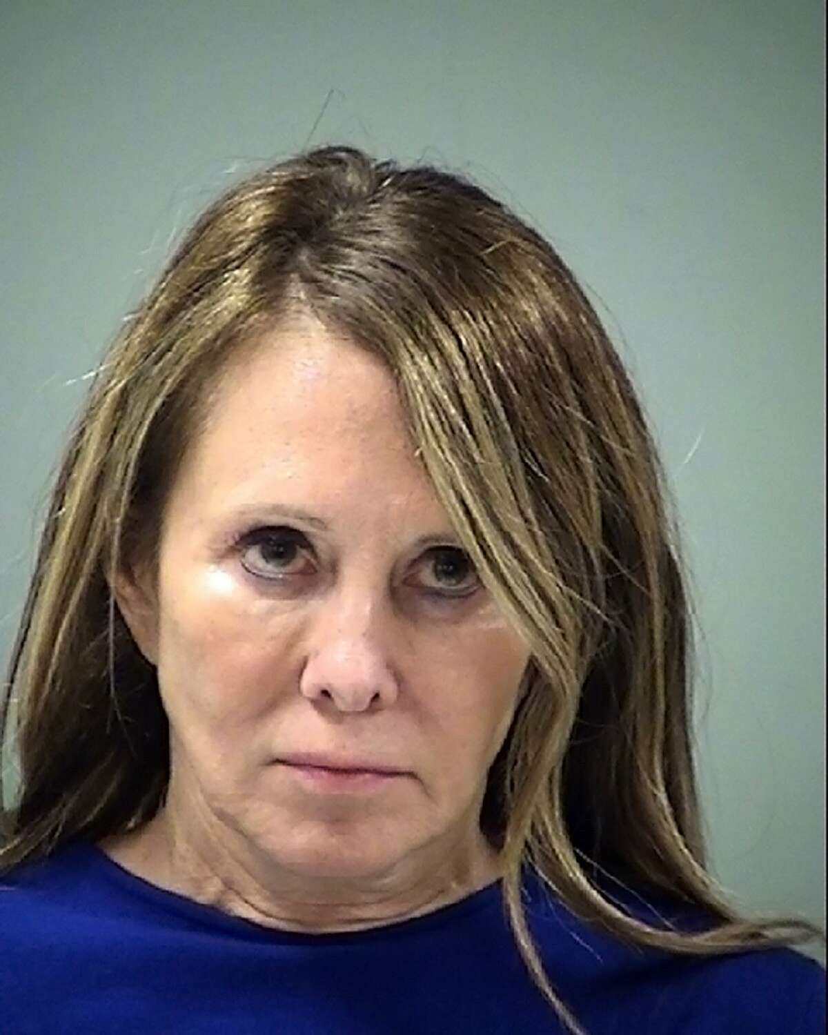 Catherine Amato, 63, was charged with driving while intoxicated after she nearly hit a San Antonio police officer's vehicle in February. The incident and actions of the DA's office that followed have been scrutinized by the media and become a talking point in the race for District Attorney Nico LaHood's seat.