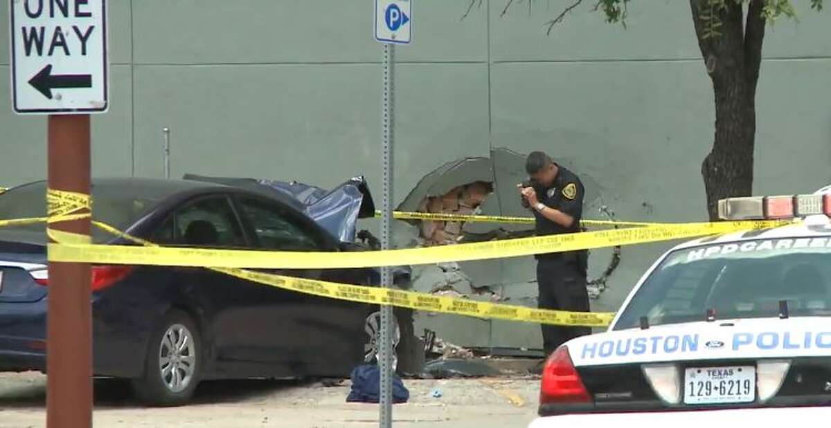 Car kills pedestrian, crashes into downtown Houston