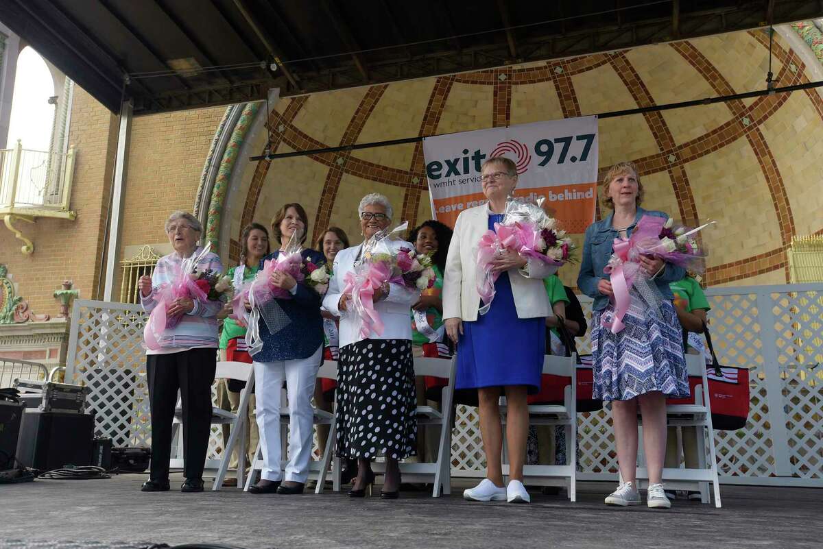 Finalists for Mother of the Year, from left to right, Joan Duffey from Watervliet, Joanne Joseph from Ballston Spa, Harriet Lovelady from Albany, June MacClelland from Wilton and Kathleen Shaw from Cohoes stand on stage at the start of the 20th Annual Mother of The Year Award Ceremony at the annual Tulip Festival on Sunday, May 13, 2018, in Albany, N.Y. The Mother of the Year Award is Presented by St. Peter's Health Partners, Times Union, and B95.5. (Paul Buckowski/Times Union)