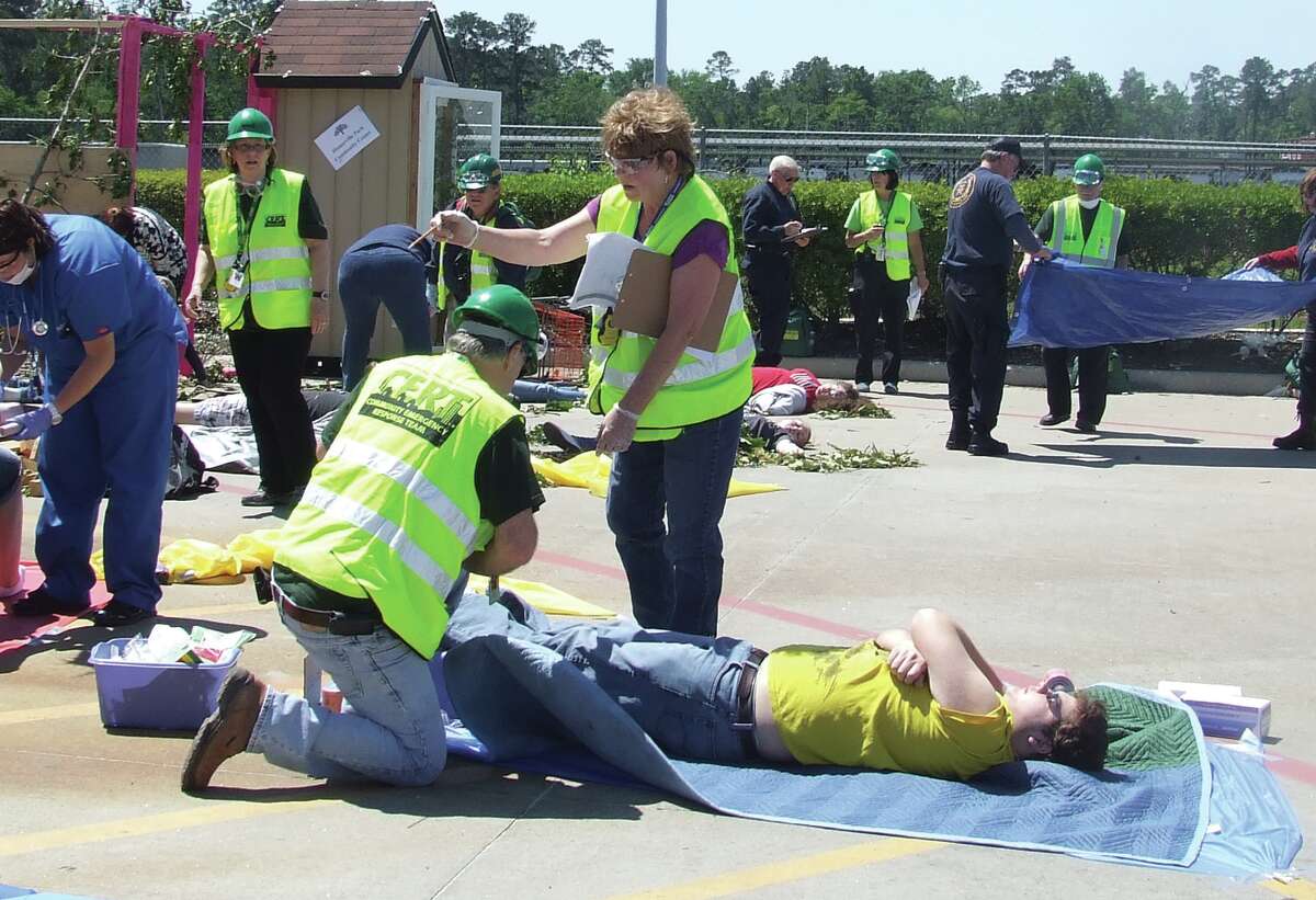 Members of the East 1488 CERT team perform a disaster simulation