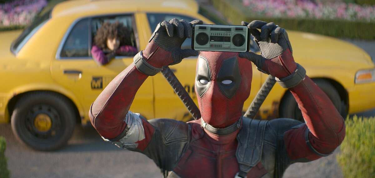 This image released by Twentieth Century Fox shows Ryan Reynolds in a scene from "Deadpool 2." (Twentieth Century Fox via AP)