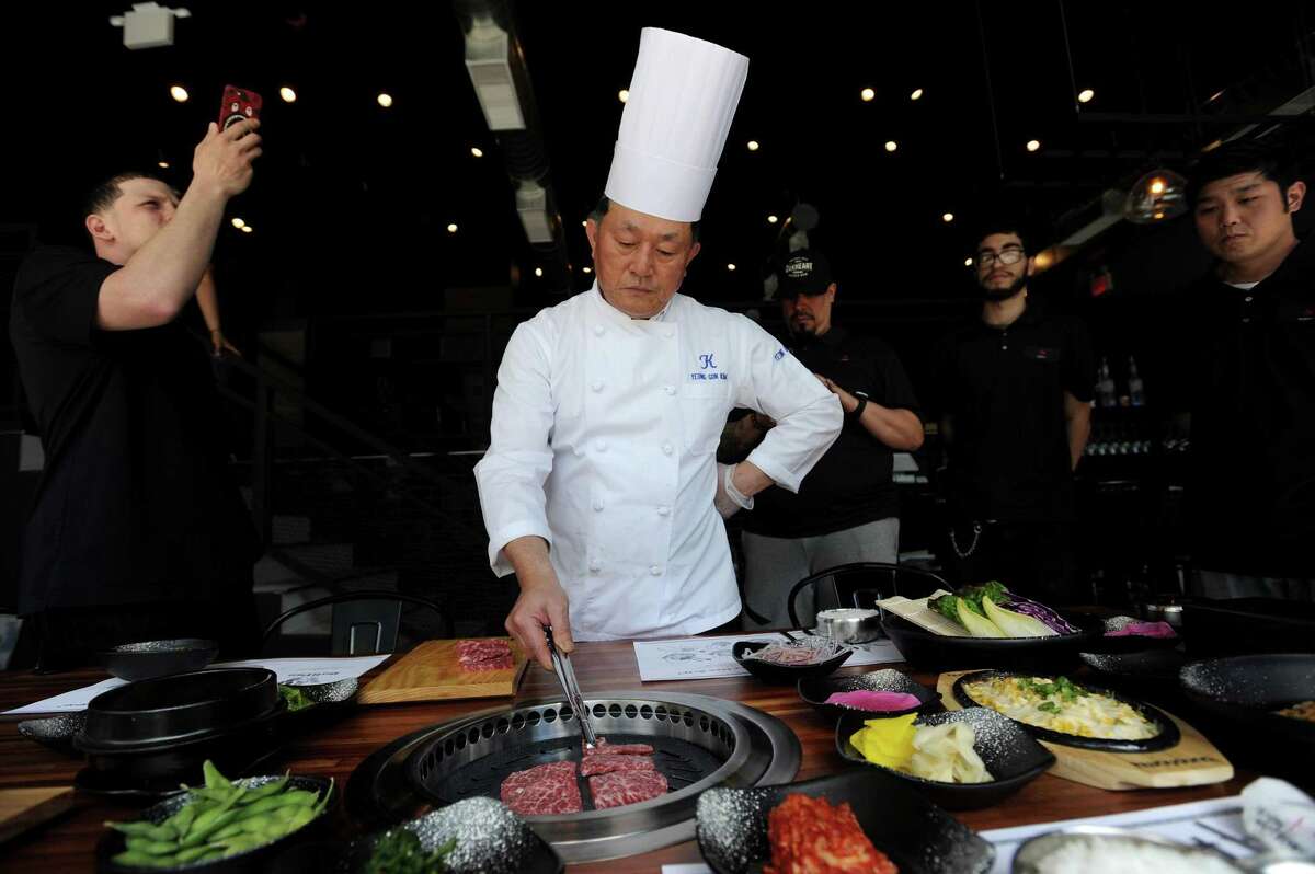 Chef Kim Yeong Gon cooks wagu beef during a tabletop demonstration inside the Bull Pan Korean BBQ at 485 Summer St., in downtown Stamford, Conn., on Monday, May 7, 2018.