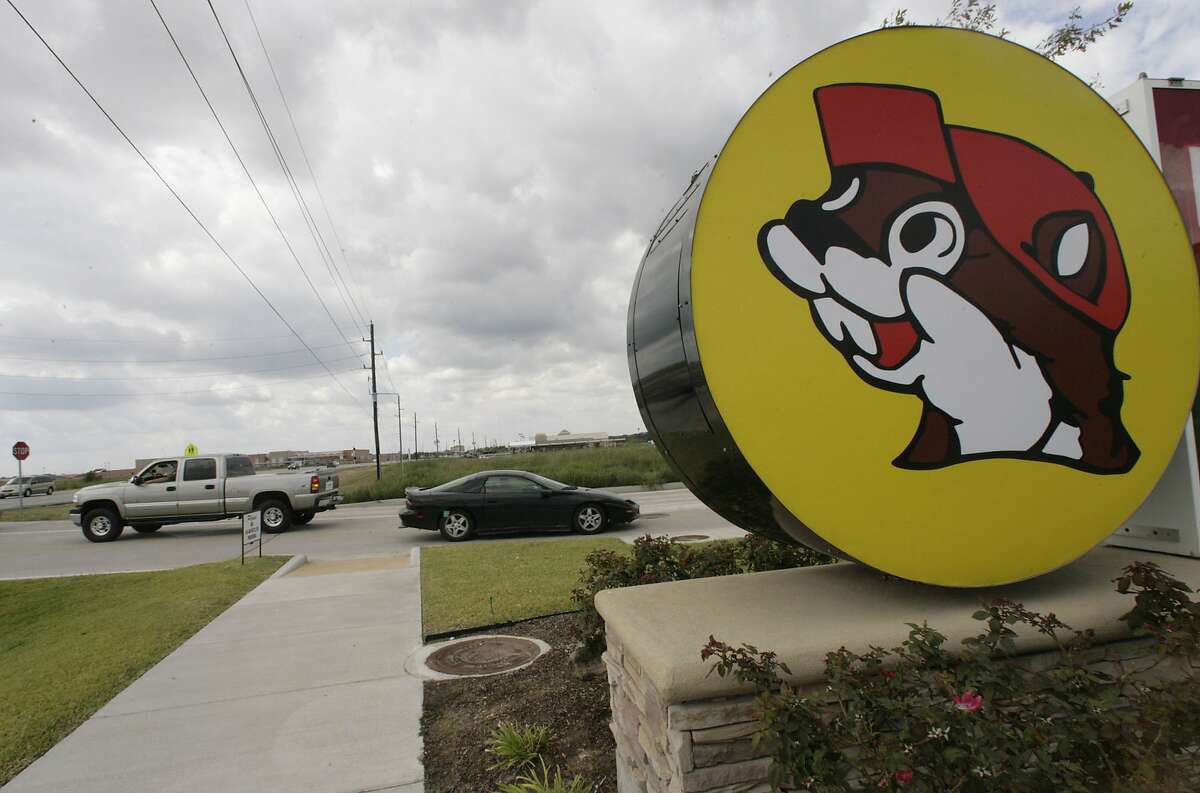 Cars are seen entering and leaving the Buc-ee's convenience store/gas station on Sunday, Oct. 5, 2008, in Pearland. A lawyer for the popular roadside emporium told a federal jury Tuesday that competing chain Choke Canyon Bar-B-Q intentionally used a cartoon animal in its logo to confuse drivers.