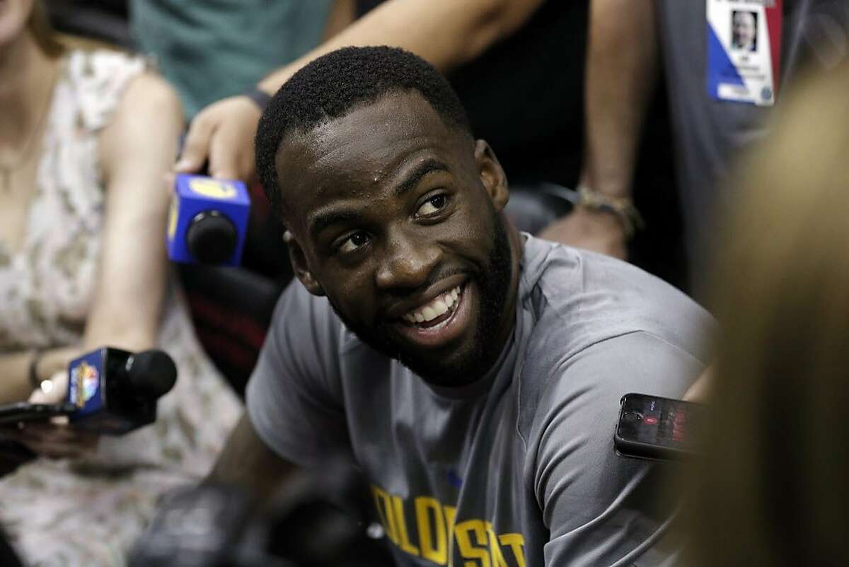 Draymond Green (23) talks with reporters during a morning shoot around before the Golden State Warriors played the Houston Rockets in Game 1 of the Western Conference Finals at Toyota Center in Houston, Texas., on Monday, May 14, 2018.