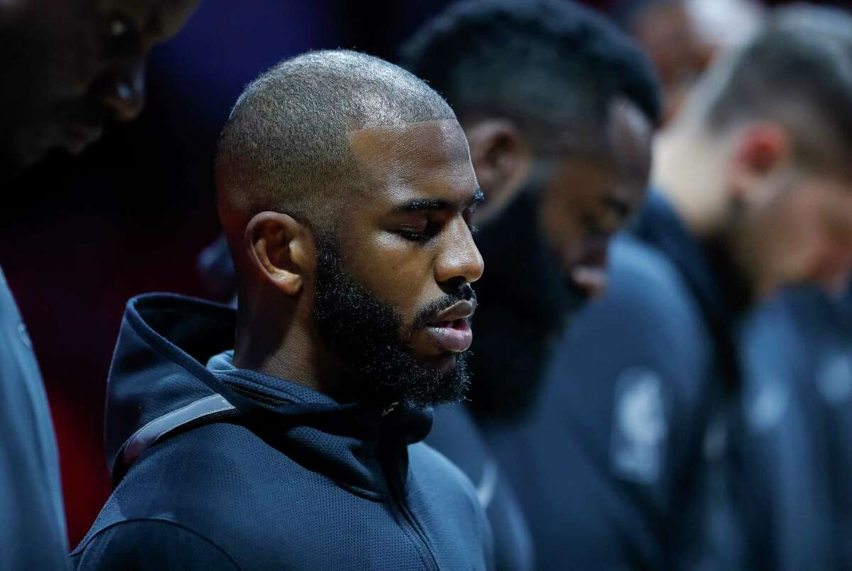 Chris Paul bows his head before Game 1 of the NBA Western Conference Finals at Toyota Center on Monday, May 14, 2018, in Houston.