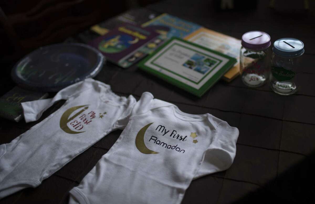 Baby onesies for Ramadan and Eid created by Asma Malik and sold at her Etsy store called Sweet Crafts by Asma. 