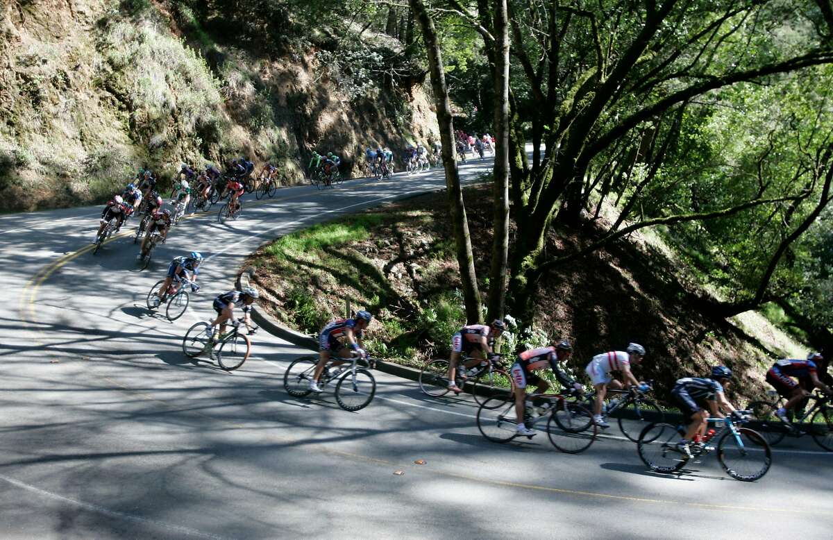 The pelaton speeds down the Panoramic Highway through Muir Woods during the 2007 Amgen Tour of California.