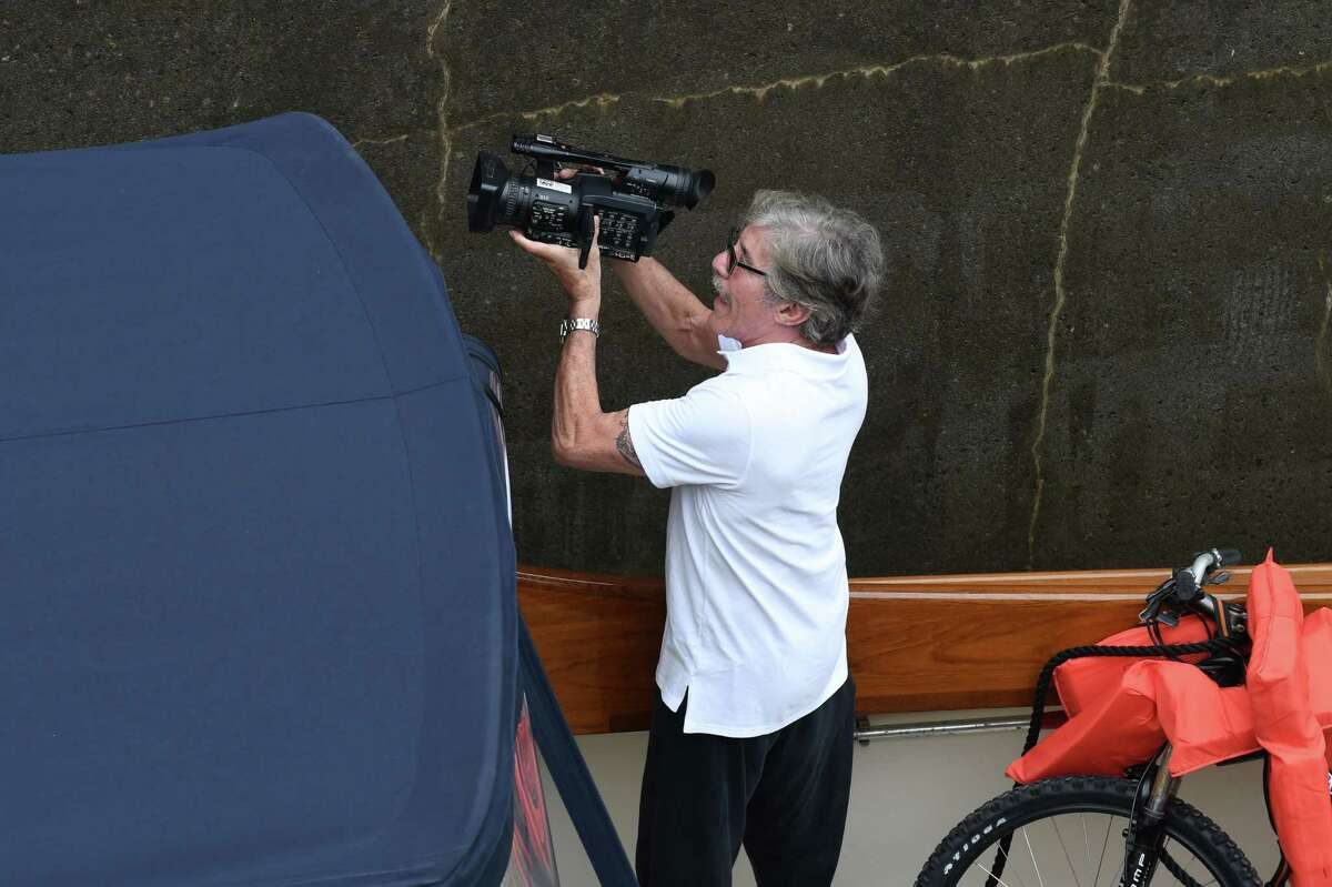 TV personality Geraldo Rivera films from inside Lock 2 where he was on one the first boats to begin the canal's navigation season on Tuesday, May 15, 2018, in Waterford, N.Y. Rivera was sailing from New York to Cleveland. (Will Waldron/Times Union)