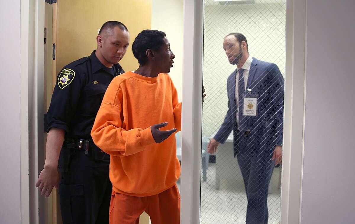 As part of the public defender pretrial release unit deputy public defender Chesa Boudin (right) in the interview room after questioning inmate D.J.(middle) in room #2 at county jail #2 unit on Monday, May 14, 2018 in San Francisco, Calif.
