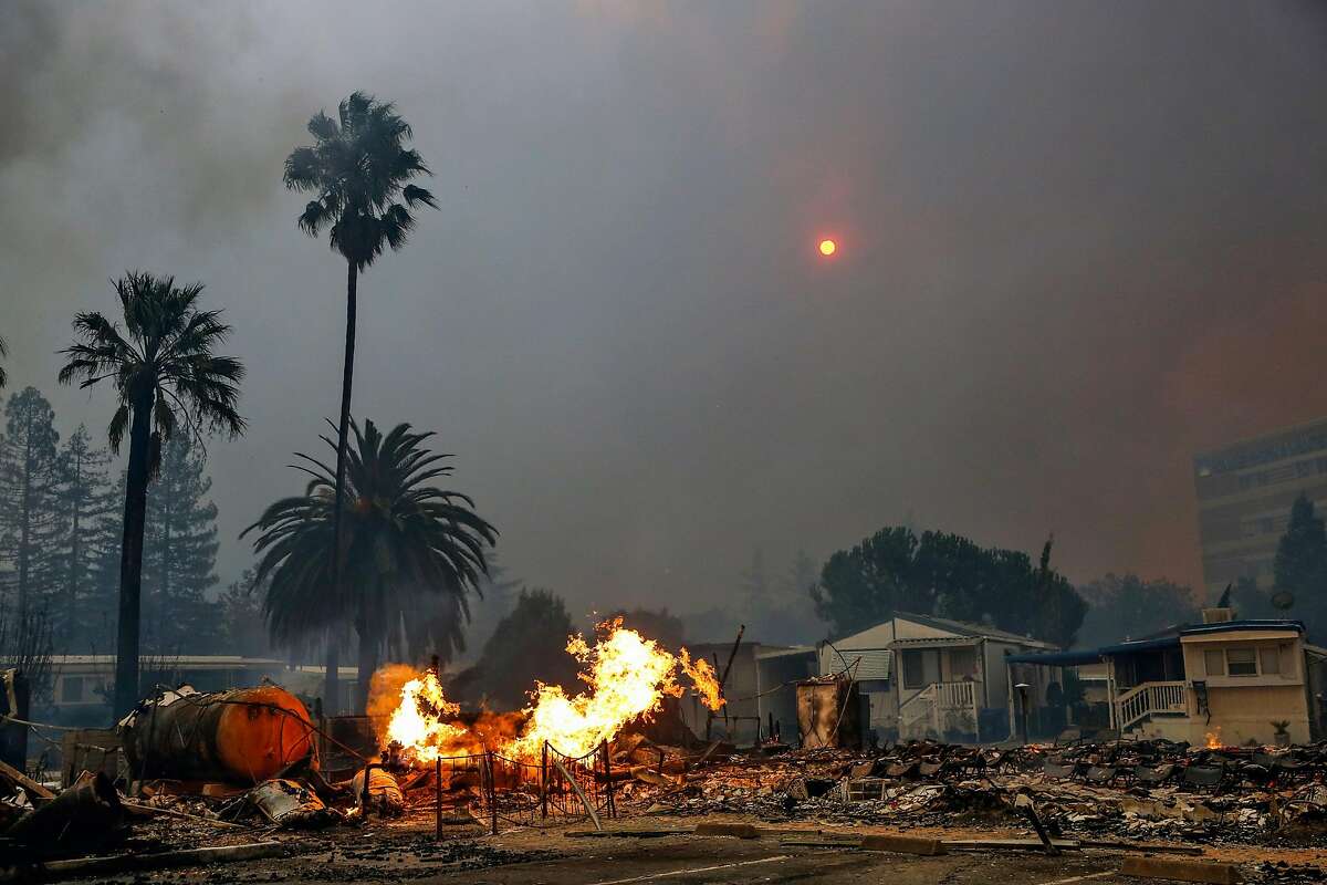 The Tubbs fire tears through parts of the Journey's End mobile home park on Mendocino Avenue in Santa Rosa, Calif., on Monday, Oct. 9, 2017.