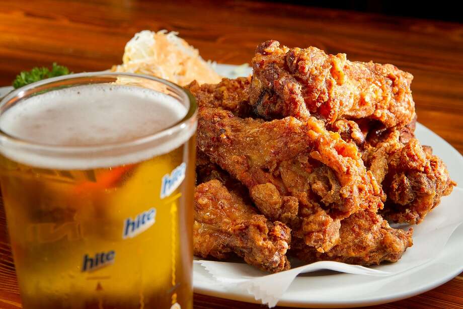 The Chicken Wings with a Korean Beer at Toyose restaurant in San Francisco, Calif., is seen on Wednesday, July 17th, 2012. Photo: John Storey / Special To The Chronicle