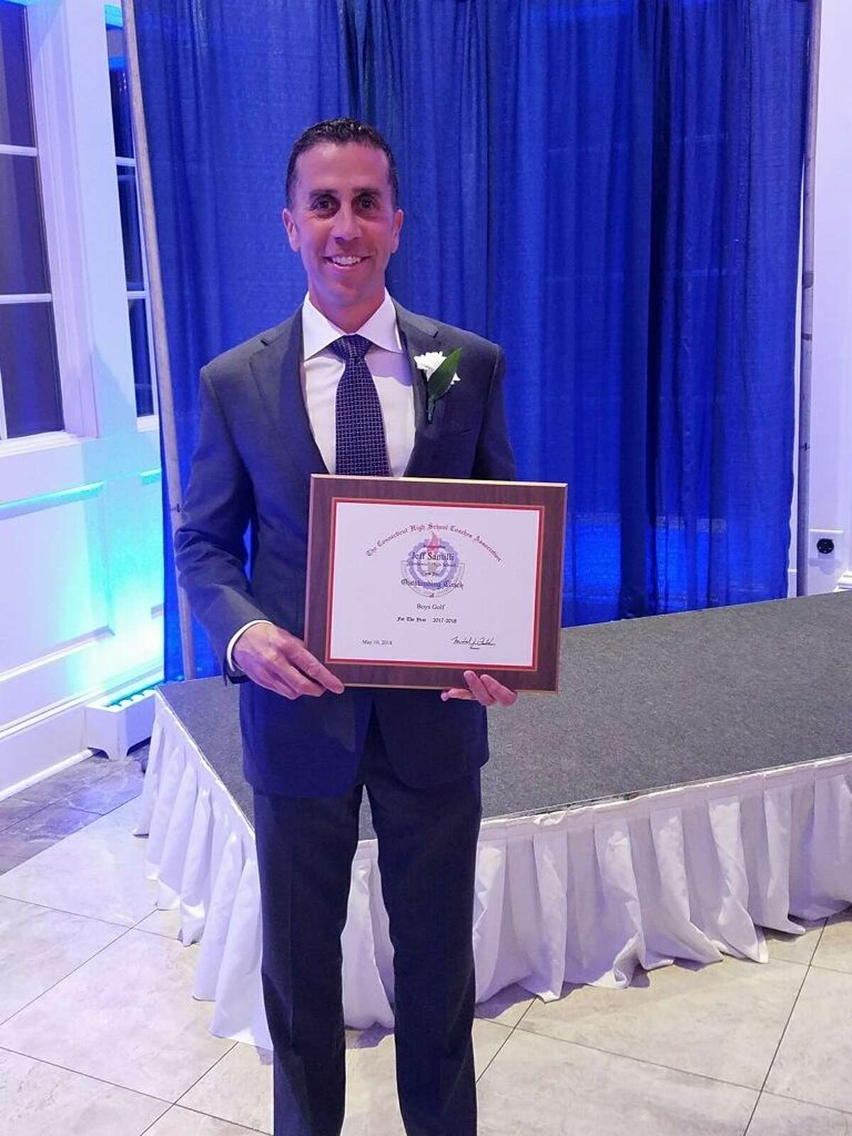 Greenwich coach Jeff Santilli holds his plaque at 54th annual Recognition Dinner on May 10 at the Aqua Turf in Southington.