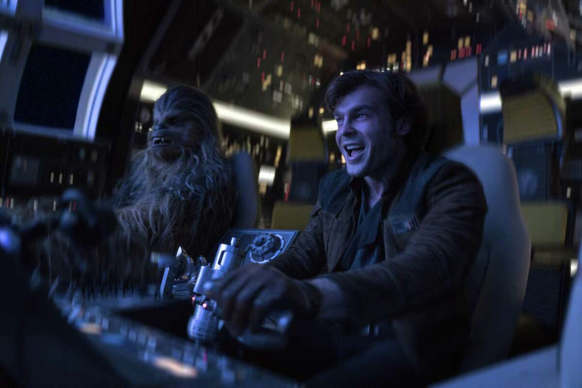 Alden Ehrenreich, right, and Joonas Suotamo appear in a scene from “Solo: A Star Wars Story.”