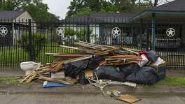 A pile of debris sits on a curb along Talton Street in the East Houston neighborhood south of Halls Bayou, Wednesday, March 28, 2018, in Houston. Homes throughout the neighborhood, which is not designated as being in a floodplain, were extensively flooded by Harvey as well as earlier flood events, especially Tropical Storm Allison. ( Mark Mulligan / Houston Chronicle )