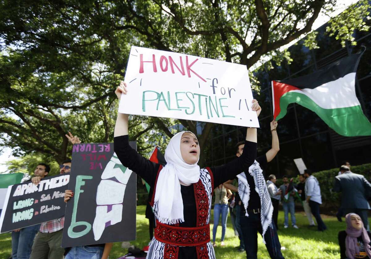 Raya Kanaan, a sophomore studying business at the University of Houston, participates in a protest with other members of the UH group Students for Justice in Palestine, outside the Consulate General of Israel at Greenway Plaza on Tuesday, May 15, 2018, in Houston.