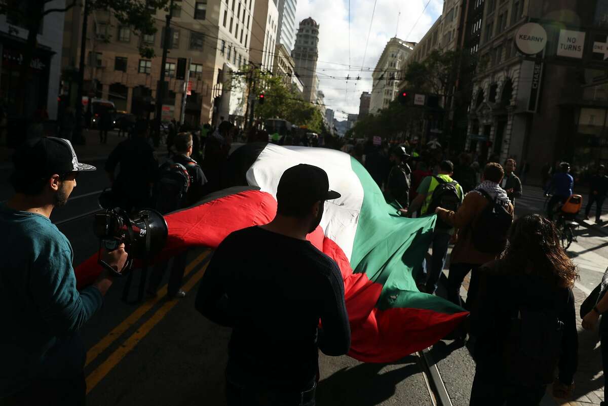 Palestinians march down Market Street during the "Nakba Day Protest" in San Francisco, CA on Tuesday, May 15, 2018.