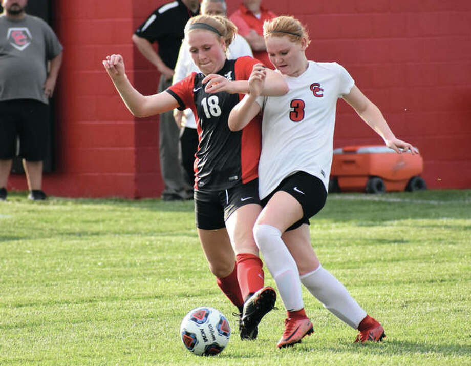 Alton’s Maggie Evans (left) and Granite City’s Anna Stearns compete for the ball during a semifinal match at the Granite City Class 3A Regional. The Warriors defeated the Redbirds 1-0 and will play top-seeded Edwardsville for the regional title on Friday. Photo: 





Matthew Kamp / Hearst Newspapers





