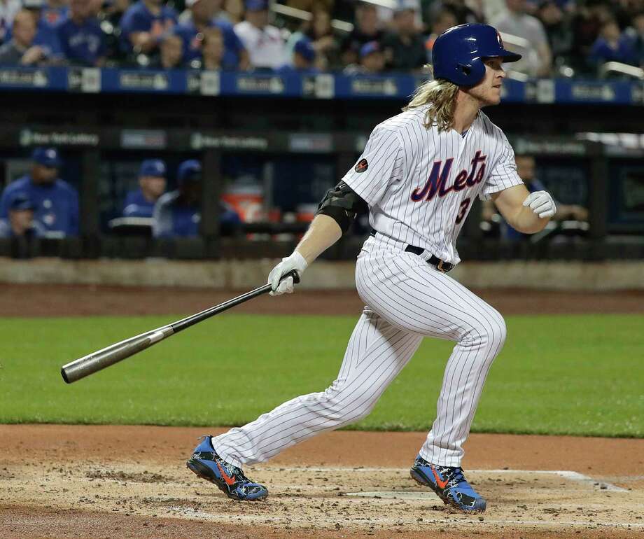 New York Mets' Noah Syndergaard (34) doubles to right field to drive in a run against the Toronto Blue Jays during the second inning of a baseball game, Tuesday, May 15, 2018, in New York. (AP Photo/Julie Jacobson) Photo: Julie Jacobson / Copyright 2018 The Associated Press. All rights reserved.