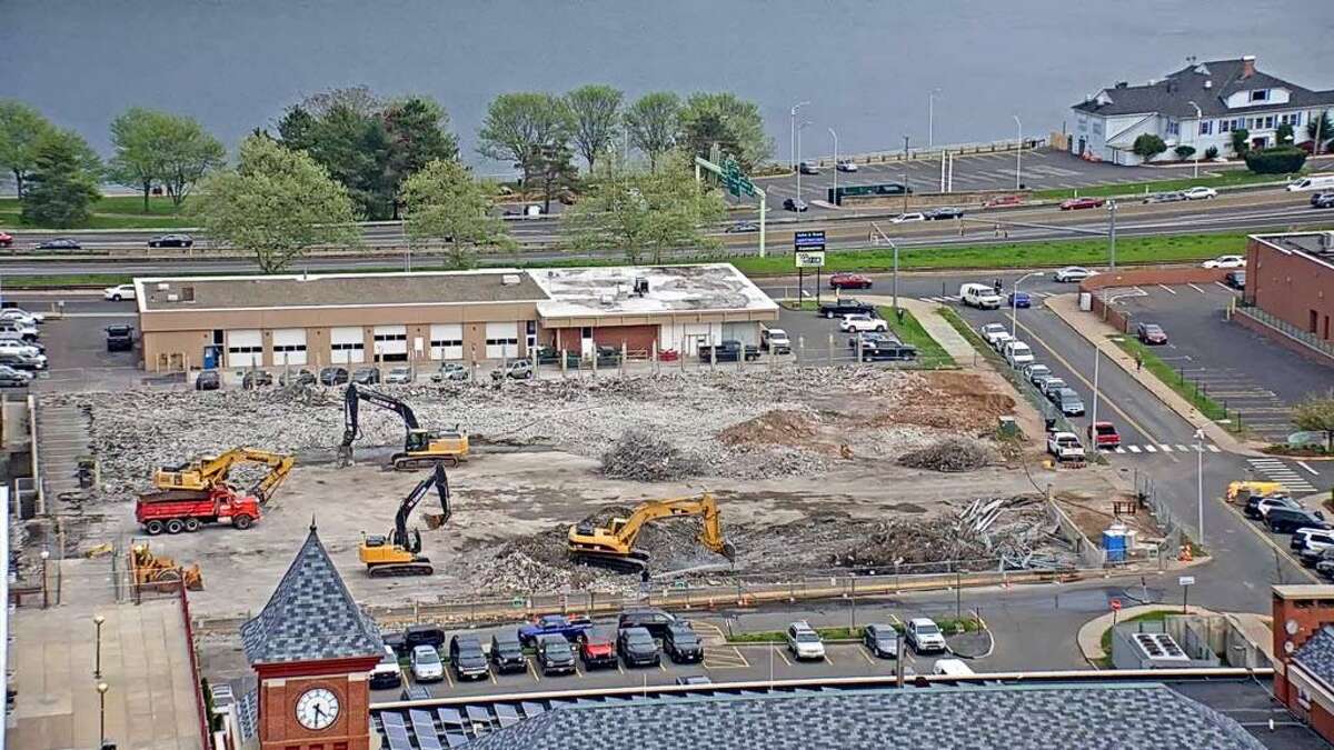 Demolition of the city’s parking arcade off Court Street is 99 percent complete. Work began May 1 on the garage, which will be replaced by a single-floor gravel lot once work is complete. This photo is taken from the Middlesex Mutual building on Court Street.